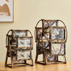 A set of vintage resin rotating photo frames displayed on a wooden surface.