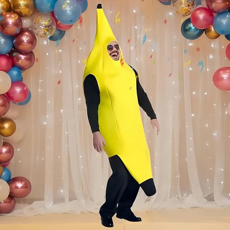 A person dressed in a yellow banana costume with black clothing standing in front of a sheer curtain backdrop decorated with 