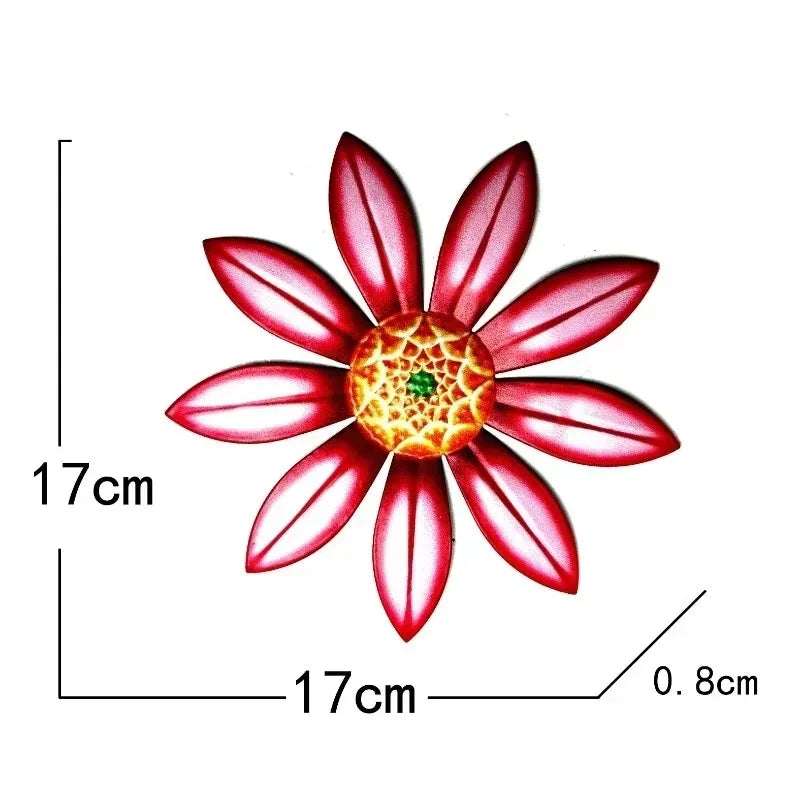 Escultura de flor de metal roja vibrante con 17 cm de pétalos y un núcleo amarillo central.
