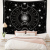 Black tapestry featuring a celestial design with sun, moon, and zodiac symbols.