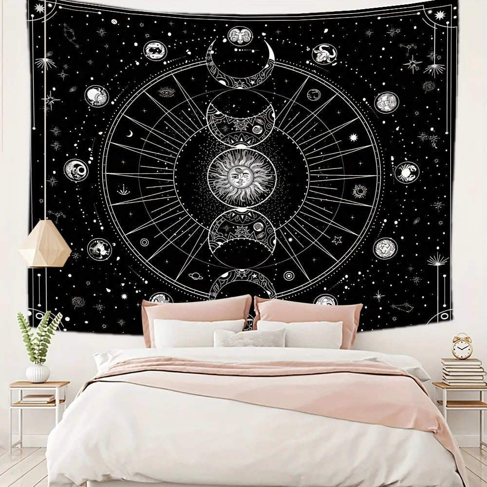 Black tapestry featuring a celestial design with sun, moon, and zodiac symbols.