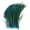 A bundle of natural peacock feathers in shades of teal and green.