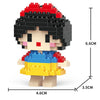 A LEGO minifigure model of a woman with black hair, pink skin, and a blue top and yellow skirt.