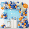A balloon garland featuring various colors and shapes, including a large bone-shaped balloon, for a birthday party decoration