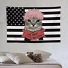 A tapestry featuring a cat with pink hair against an American flag background.