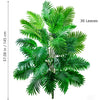 A vibrant green artificial palm tree featuring lush, feathery silk leaves.