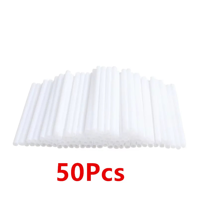 A pack of 50 white lollipop sticks for candy making arranged in a row.