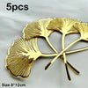 Five golden palm leaf cake toppers with flower decoration, measuring 8x12cm.