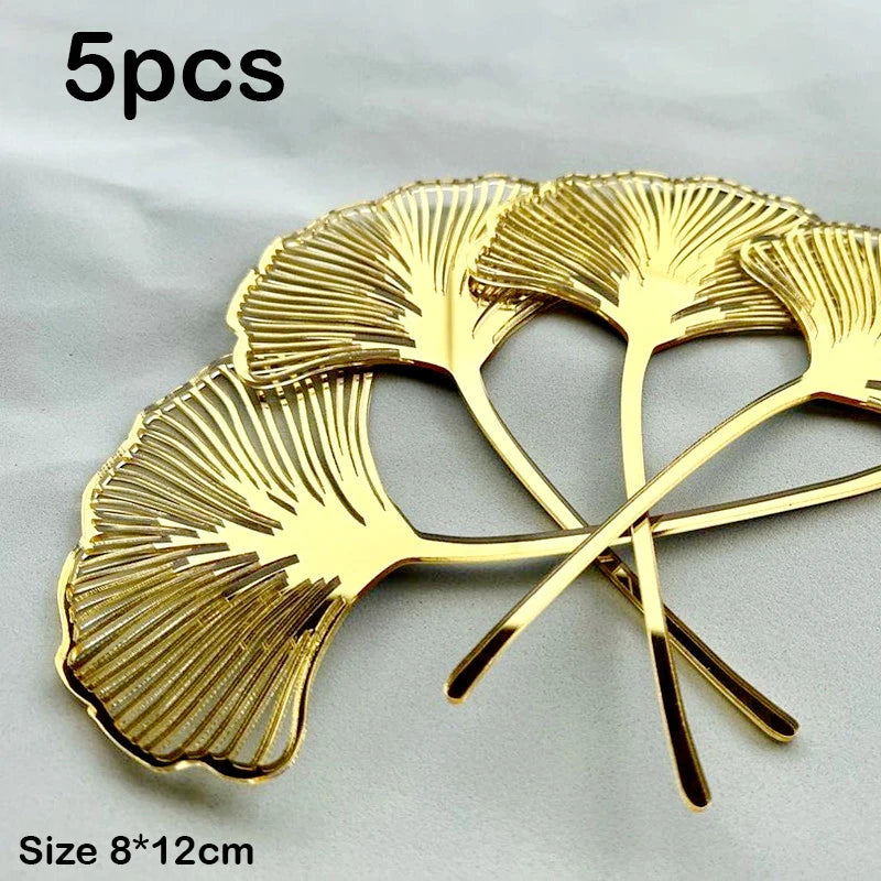Five golden palm leaf cake toppers with flower decoration, measuring 8x12cm.