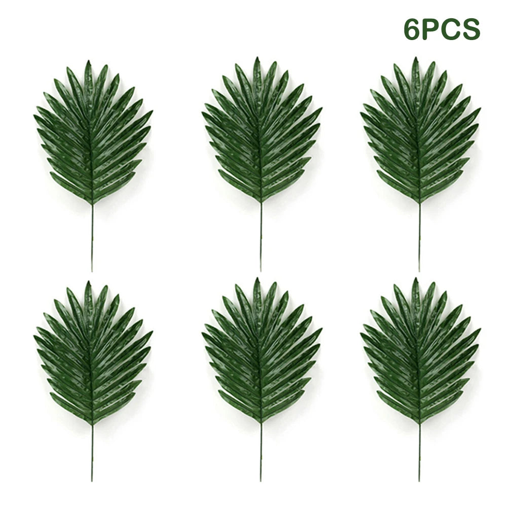 Six artificial tropical palm leaves in various shades of green displayed individually.