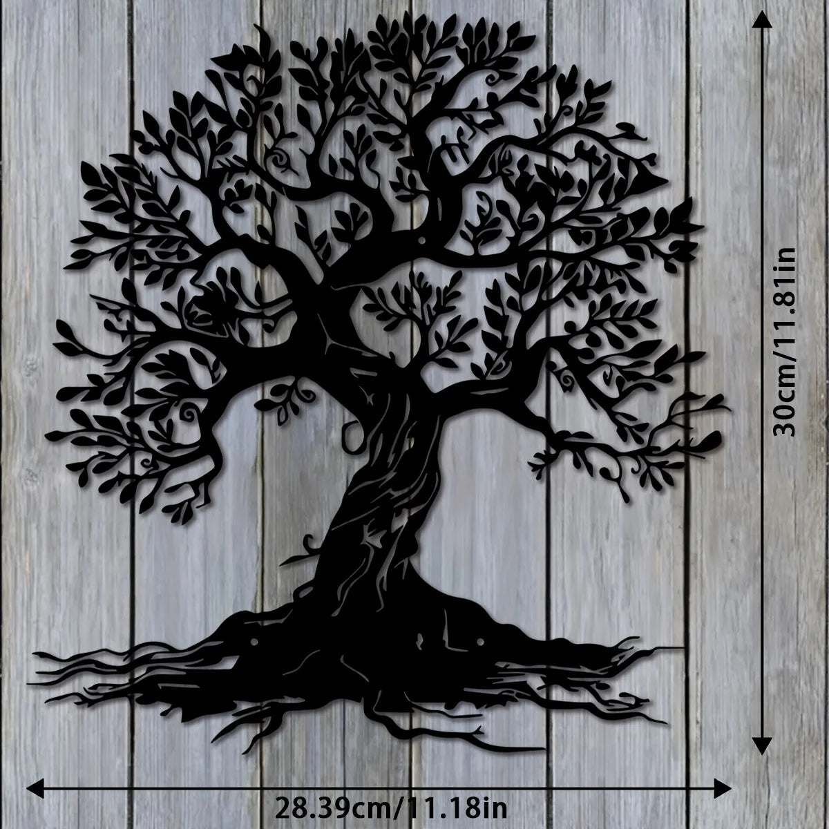 Black silhouette of a large tree with roots on a light wooden background.