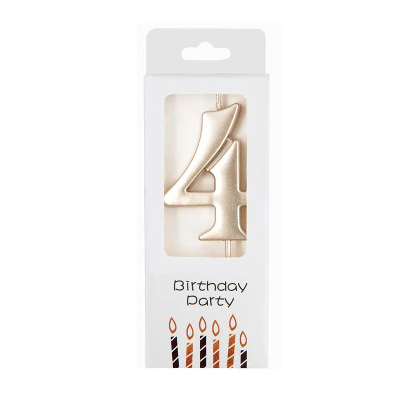 A gold number candle shaped like the number 4 for birthday party decor.