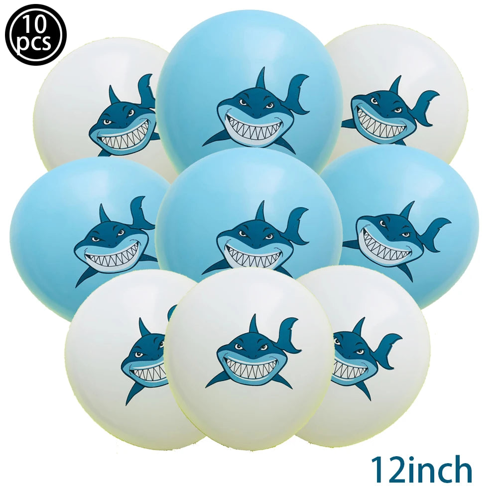 Ten blue and white shark foil balloons for an ocean-themed party decoration