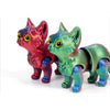 A pair of 3D printed cat figurines, one red and one green, with an articulated tail.