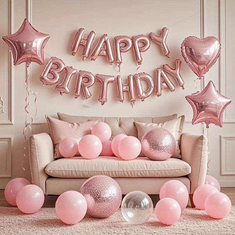 Pink marble birthday balloon decoration set featuring a banner and balloons on a light pink rug.