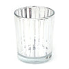 A clear glass votive candle holder with vertical ribbed texture.