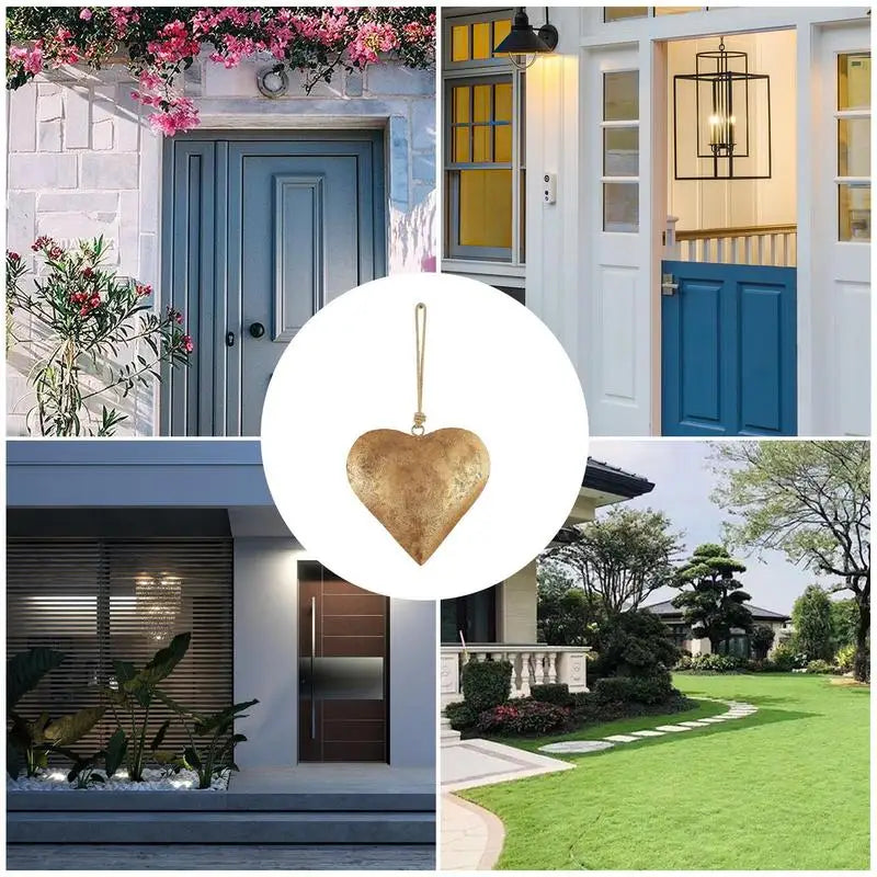 Antique golden metal heart wall decor hanging on a door