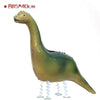 A green foil balloon shaped like a long-necked dinosaur or dragon, standing on small supports.