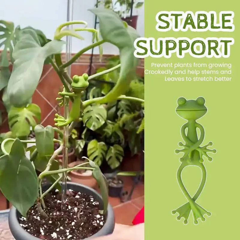 A green frog-shaped plant support clip is shown next to a potted plant, demonstrating stable support for climbing plants.