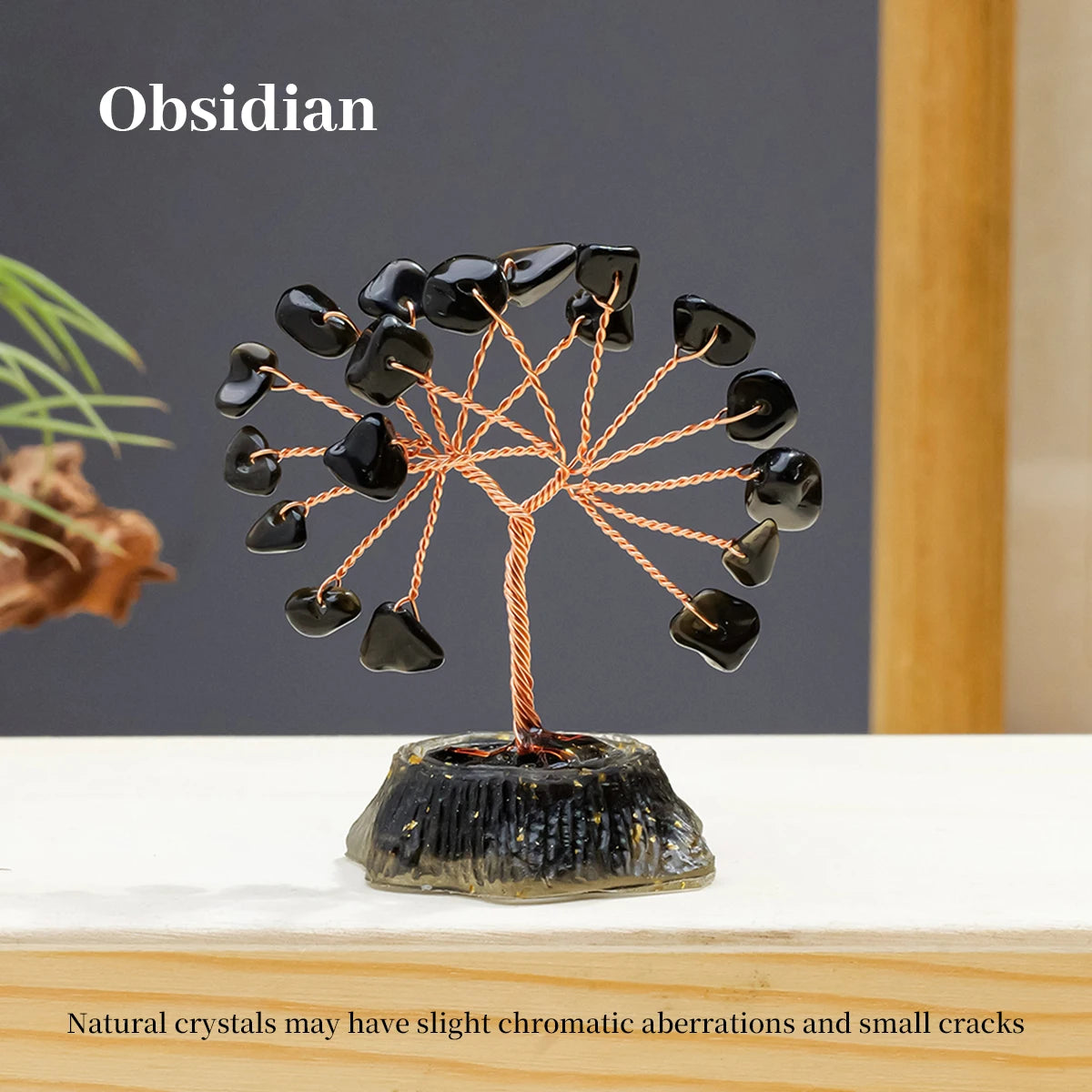 Obsidian crystal tree featuring natural black stones branching out from a base