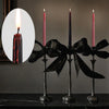 Set of four gothic vampire tears taper candles with dripping blood effect displayed on a dark surface.