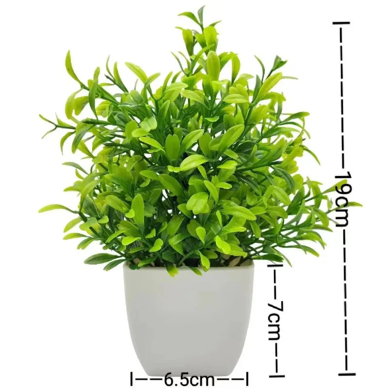 Leuchtend grüner künstlicher Bonsai in weißem Topf mit Höhenangaben.