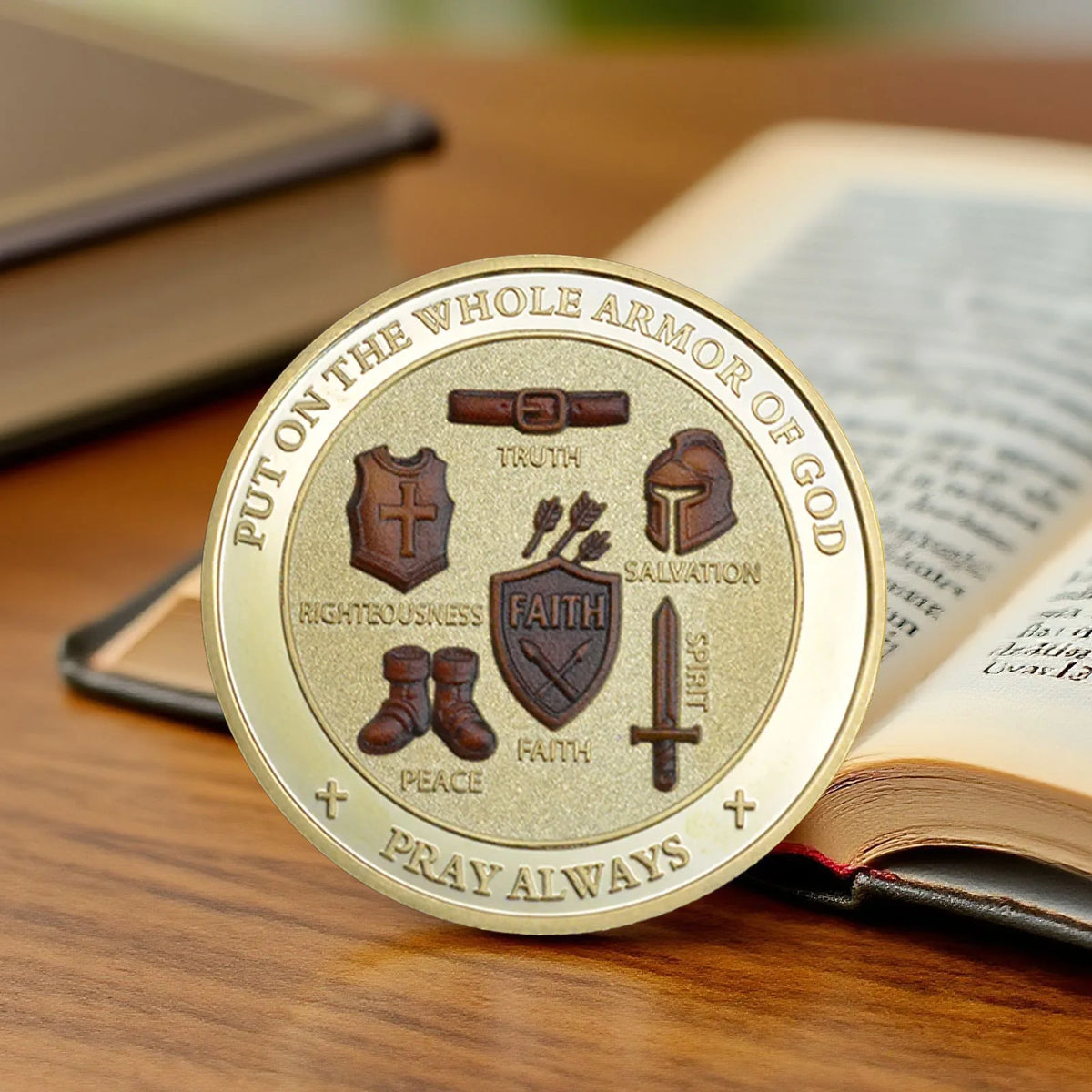 A gold-plated coin featuring various virtues like truth, salvation, peace, and faith, used as a souvenir.