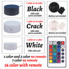 A set of 3D LED night lights in black, crack, and white colors with various USB cables and a remote control.