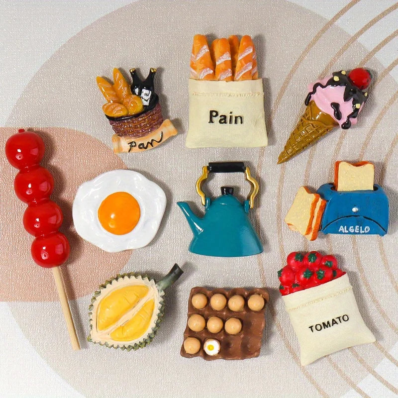 A collection of 3D resin food magnets featuring various foods like pain, egg, ice cream, and tomato.