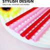 A collection of heart-shaped pink and red disposable straws are arranged on a white surface.
