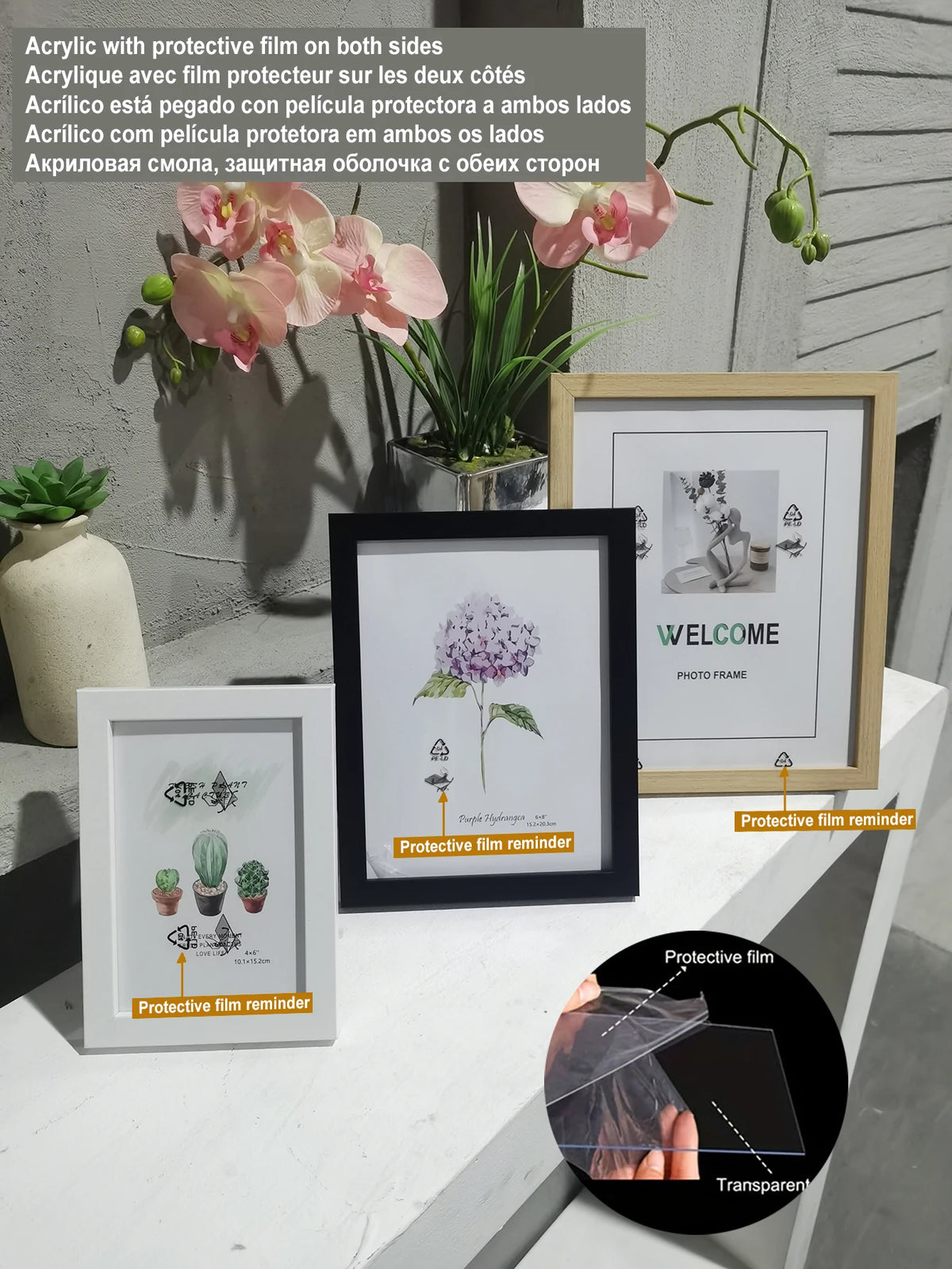 A set of acrylic photo frames with protective film reminders and a transparent film display.