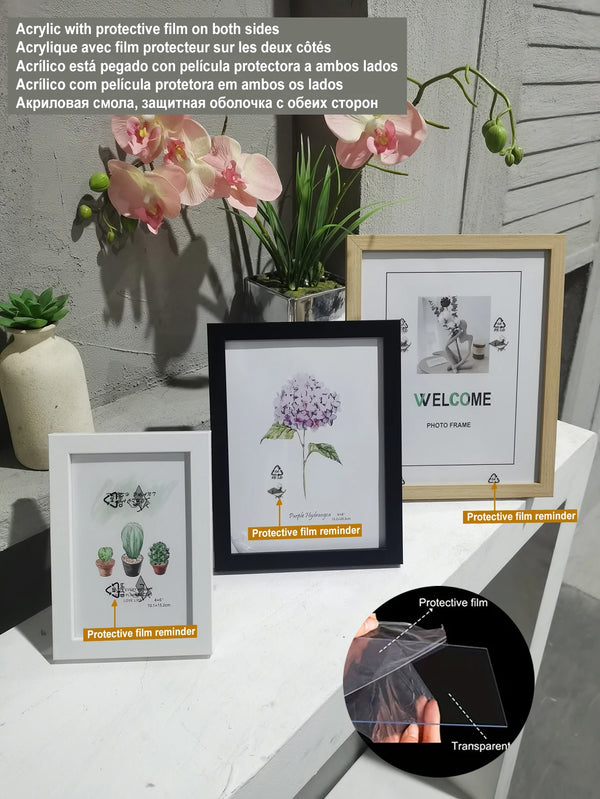A set of acrylic photo frames with protective film reminders and a transparent film display.