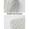 Close-up view of a white doormat showing exquisite edge treatment and an anti-slip particle bottom.