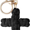 A black woven cross keychain with a gold-toned split ring and clasp.
