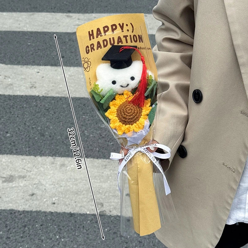 Handcrafted crochet flower bouquet featuring a teddy bear graduate theme tied with a ribbon