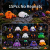 A collection of 15 plastic monster figurines including spiders, skeletons, and other creepy-cute Halloween decorations displa