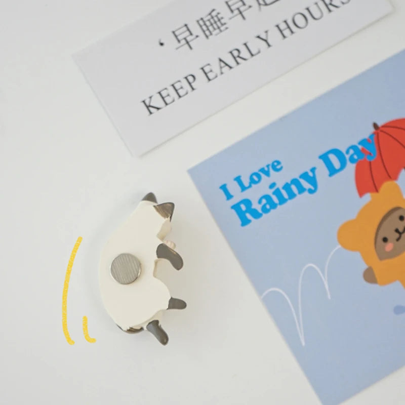 A set of six lazy cat fridge magnets featuring various designs, including a yellow and orange character.