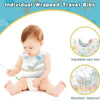 A baby wearing an individually wrapped travel bib with a food catcher pocket, demonstrating its absorbent leakproof feature.