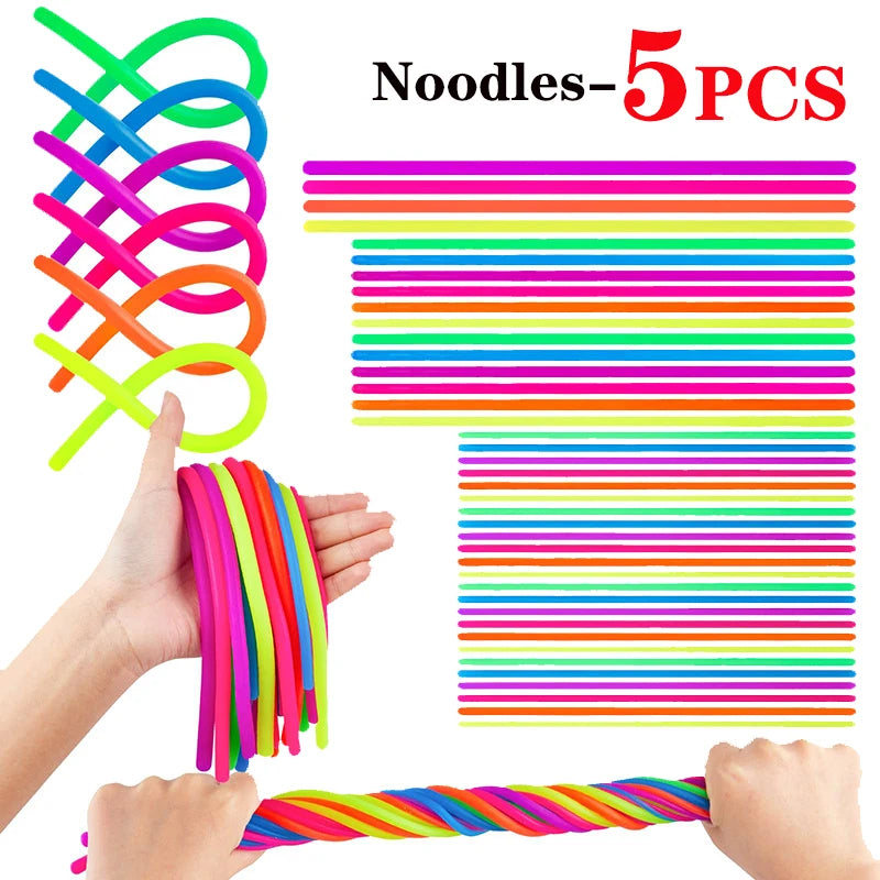 A hand is stretching a colorful noodle fidget toy set, showing various bright colored strands.