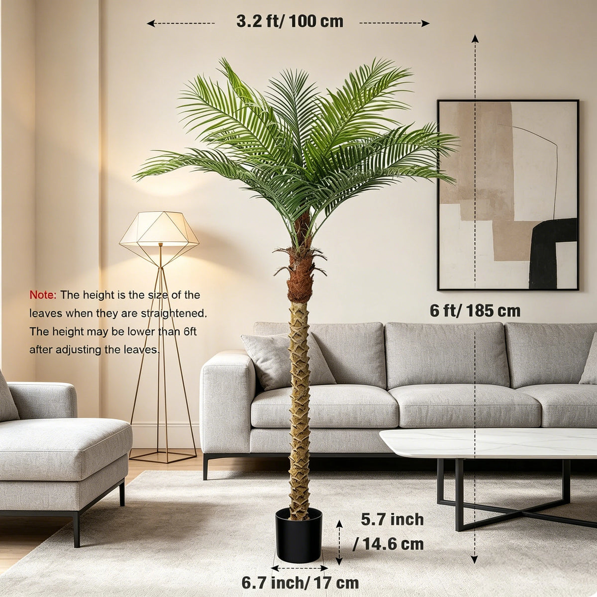 A tall artificial golden palm tree in a black pot displayed in a modern living room setting.
