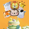 A collection of foil balloons featuring cartoon jungle safari animals like a lion, tiger, and monkey arranged around a cake.