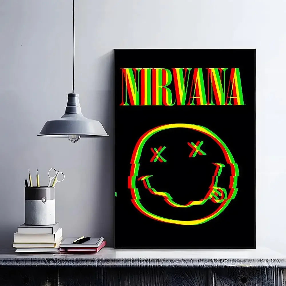 A black framed poster featuring the word NIRVANA in multicolored neon text against a black background.