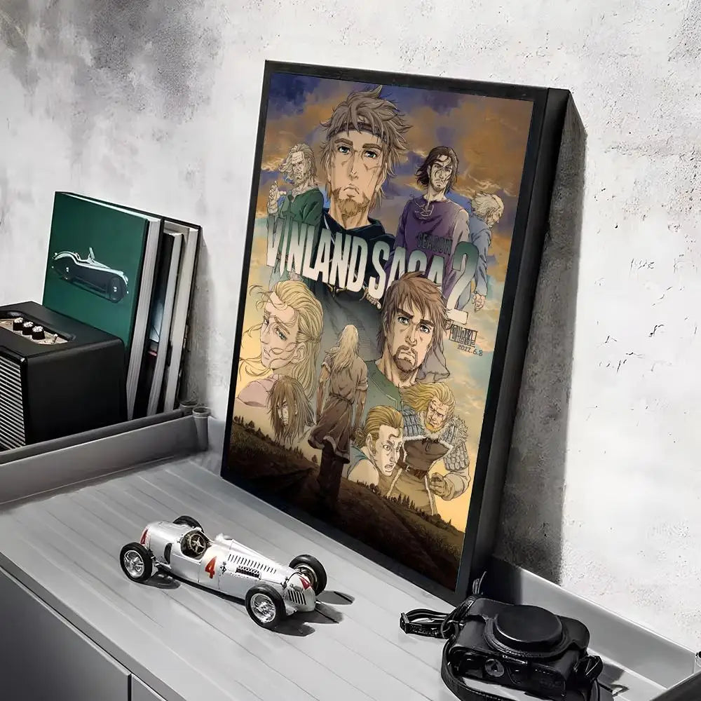 A framed poster of a Vinland Saga anime character, featuring intense facial expressions and dramatic lighting.
