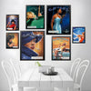 A collection of vintage Camel cigarettes retro posters displayed on a white wall.