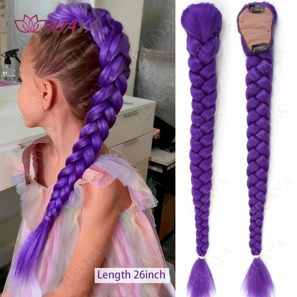 A close-up of a woman with purple braided hair, showing the length and texture of the hairpiece.