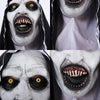 Close-up of a realistic horror nun latex mask with pale white skin, exaggerated features, and dark makeup.