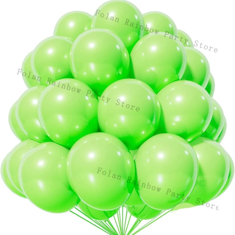 A bunch of light green latex balloons arranged in a cascade or garland formation.