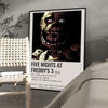 A framed poster featuring a terrifying animatronic face from Five Nights at Freddy's 3
