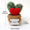 Handmade crochet potato dolls with hearts and a card displayed on a white background.