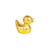 A miniature golden duck figurine.